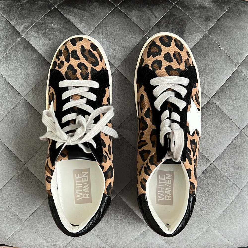 Never worn white raven sneakers!